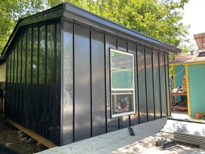 Black standing seam metal wall panels for Roof Inspection in Bloomington