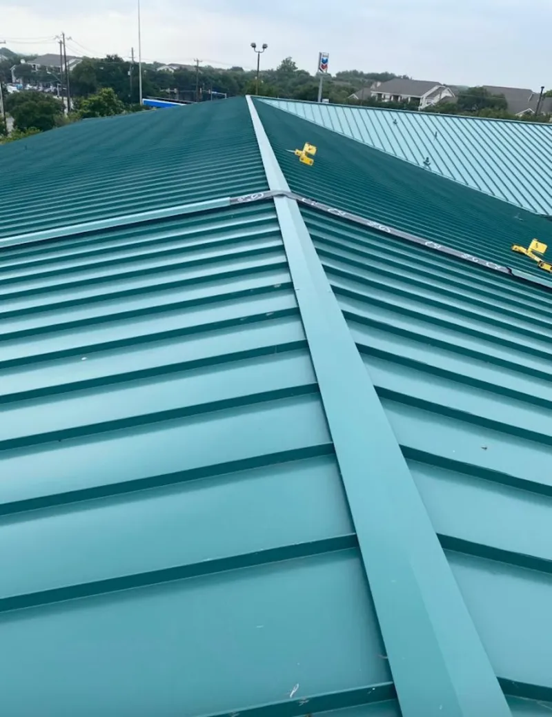 Green commercial metal roof ridge and valley for Metal Roof Repair in Bloomington