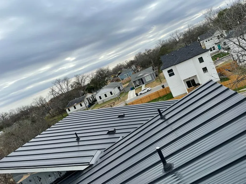 Standing seam metal roof panels with vents for Skylight Repair in Bloomington
